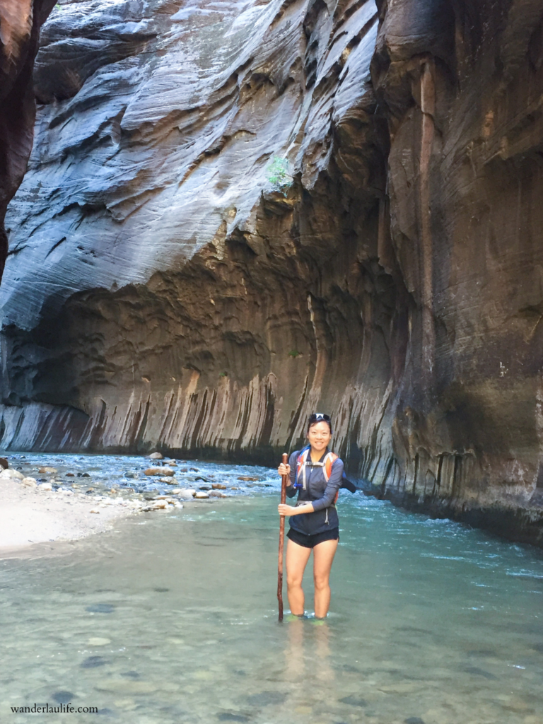 Me, standing in ankle deep water of the subway section on the trail, The Narrows, at Zion National Park.