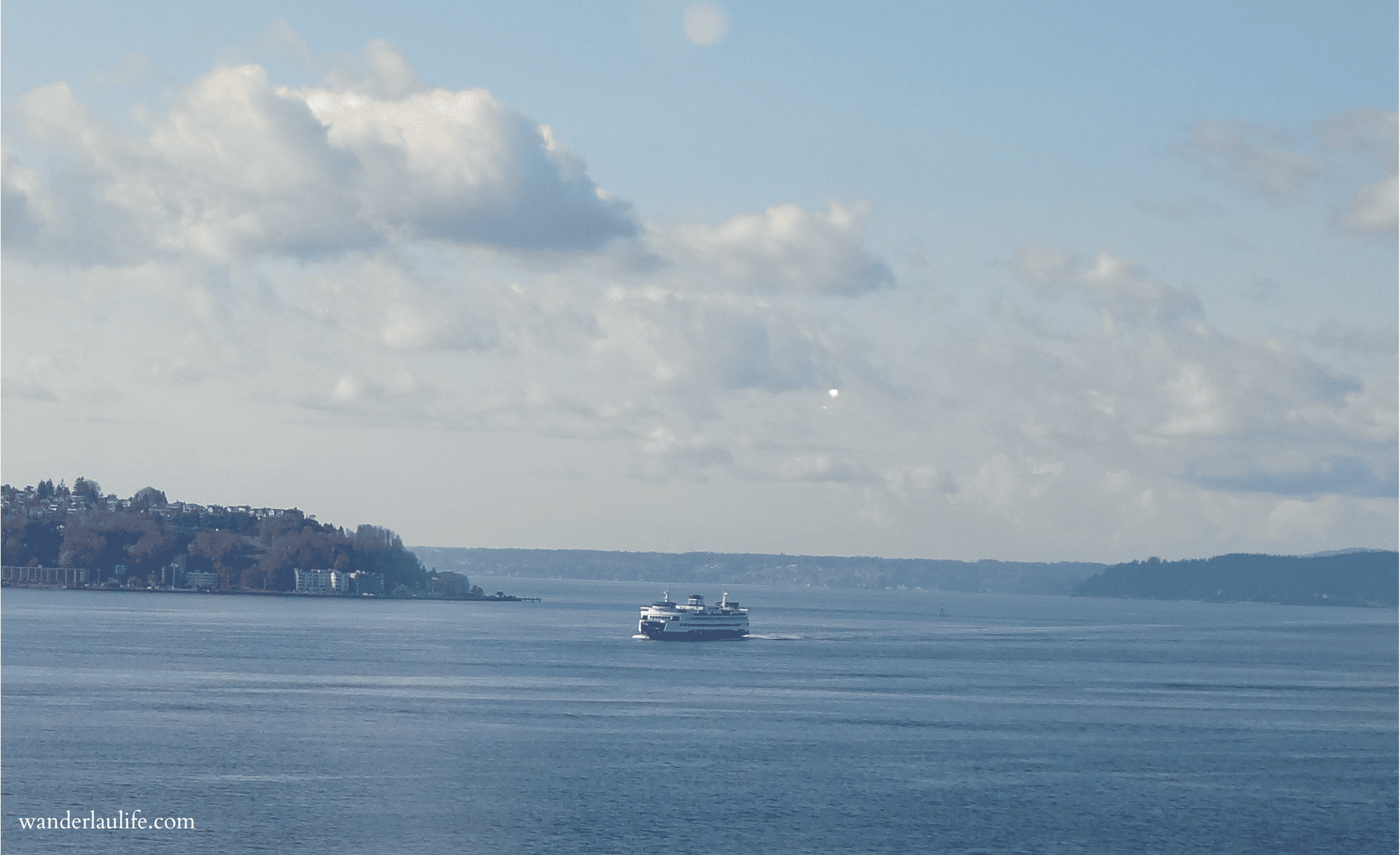 Walkable Seattle and Bainbridge: A ferry returning to Seattle from Bainbridge Island on a partly sunny early evening.