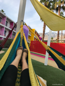 Looking up at my 2 legs while I’m resting on a swinging hammock on a sunny day.