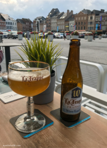 Enjoying a glass of La Trappe beer in the square of Sint-Truiden.