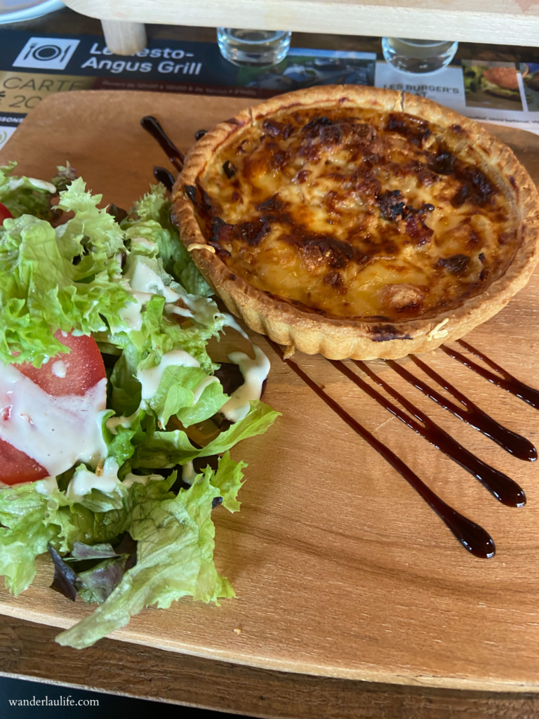 La quiche a l’Ardennaise at Rochehaut with a side salad.