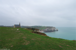 On top of Amont Cliff towards Chapelle Notre Dame de la Garde in Étretat.