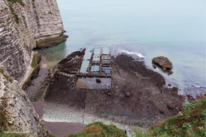 Explore the Étretat coast during low tide.