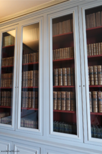 The beautiful glass case holding historic books inside the Ship-Owner’s Mansion in Le Havre, France.