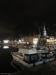 A couple of luxury boats in the Old Basin in the evening.