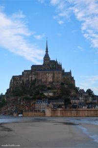 Overlook of the island Mont St Michel in France during low tide.