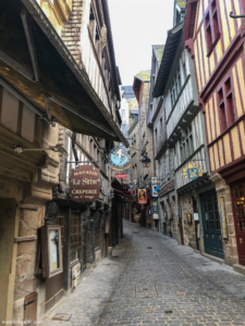 The narrow medieval street of Rue Grand in Mont Saint-Michel with no tourists.