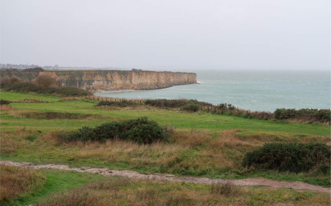 Overlooking a quiet cliff and beach in Normandy.