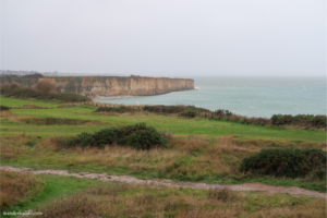 Overlooking a quiet cliff and beach in Normandy.