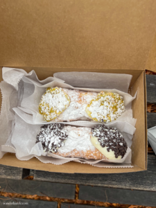 One pistachio and one chocolate chip cannoli from Mike’s Pastry.
