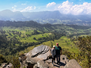 My husband and I with an incredible Colombian background of mountains and greenery on our hike in Chicaque Natural Park.